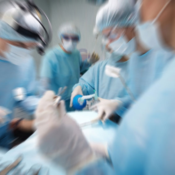 photo of physicians performing surgery