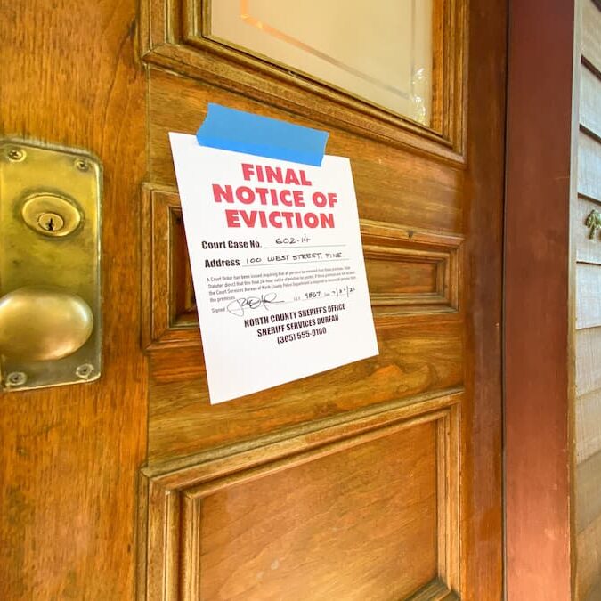 An eviction notice taped to a door