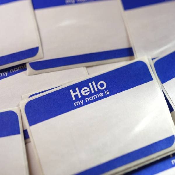 A-close-up-of-blue-and-white-Hello-my-name-is-stickers